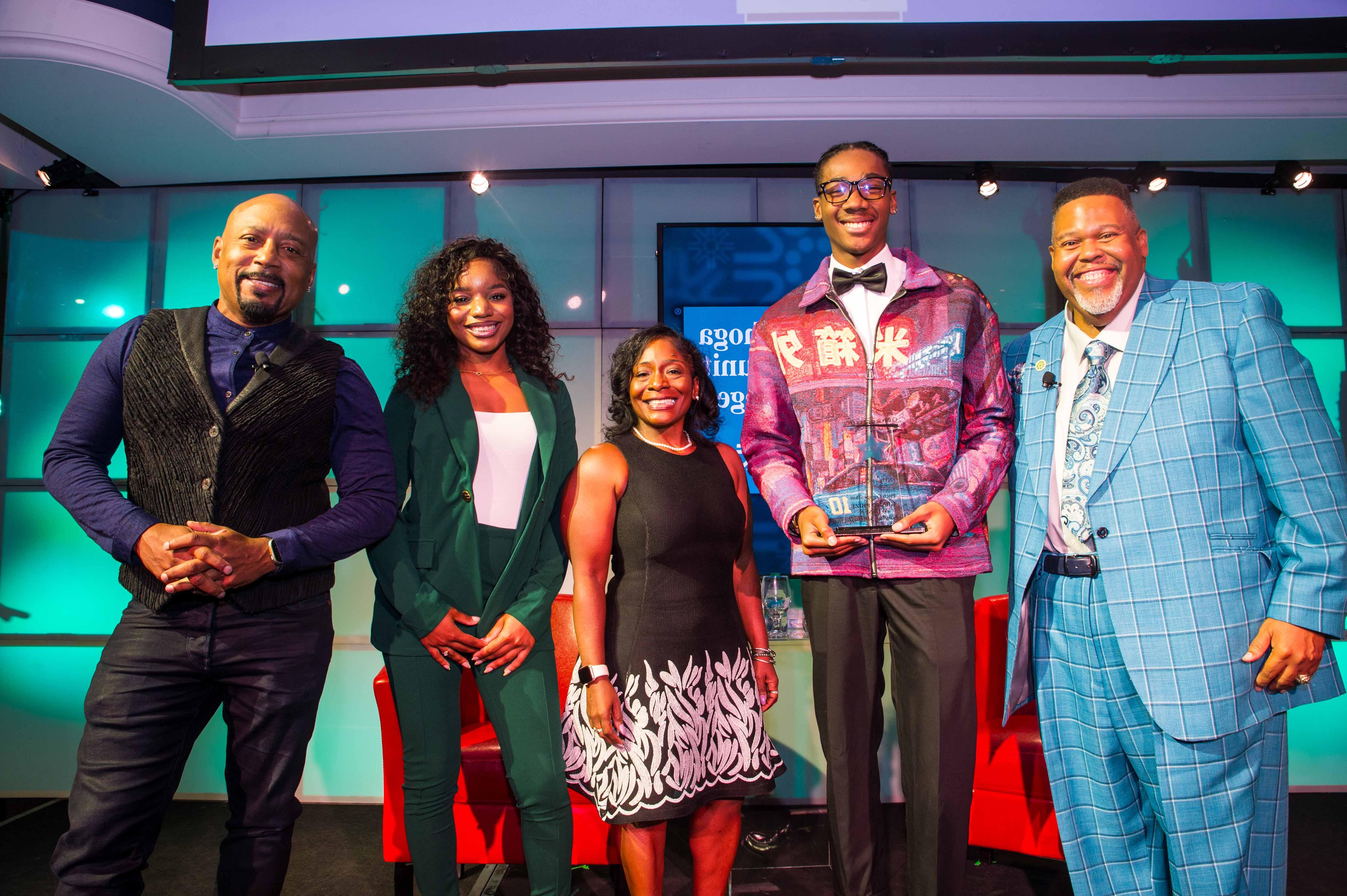 Tri-C® Center for Entrepreneurs Pitch Competition Powered by PNC winner London Mitchell and finalists Avrielle Eldemire and Jeanette Logan-Lane, Tri-C® President Dr. Michael Baston and Daymond John.